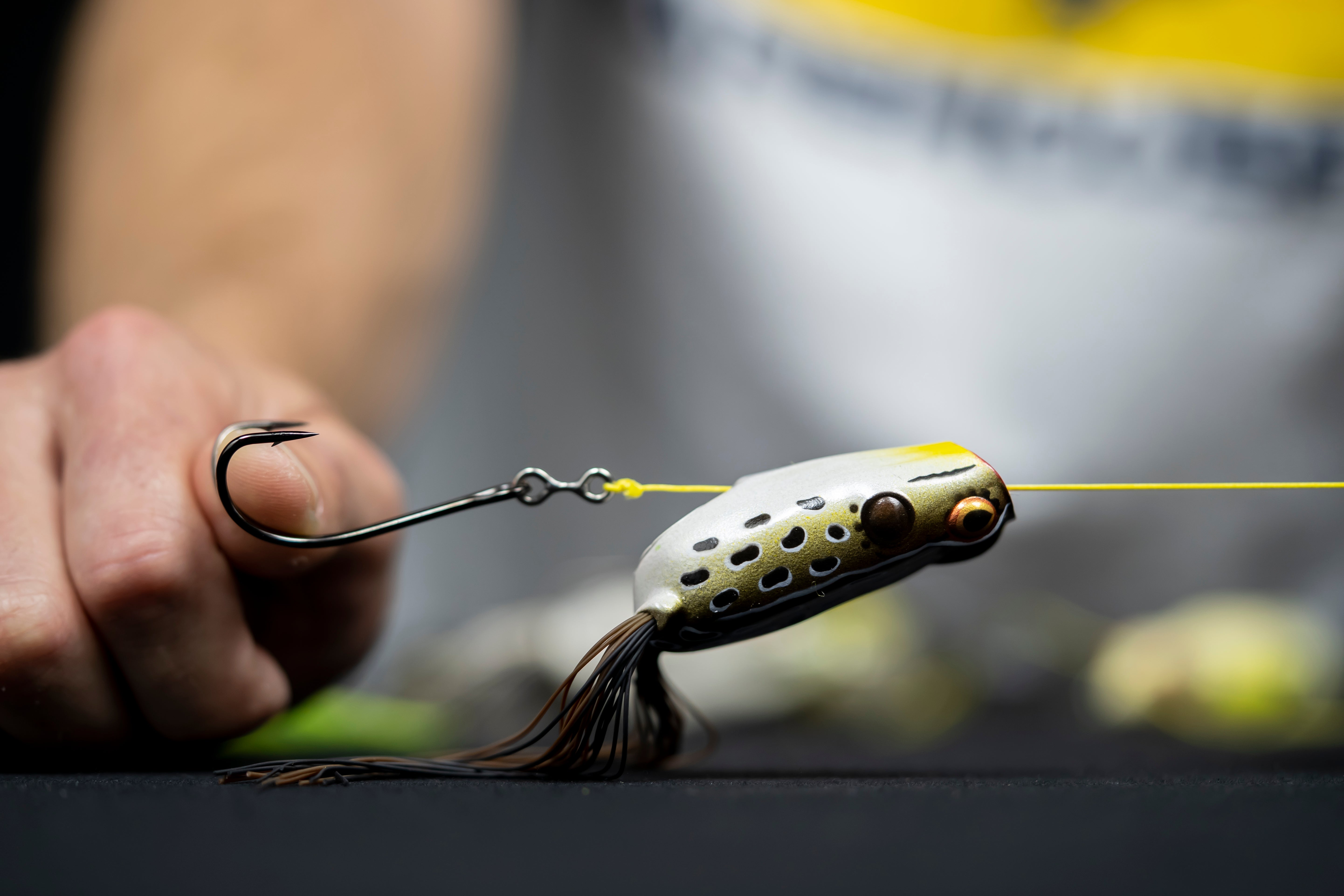Line through a hollow-body frog with the hook exposed